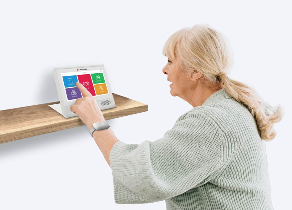 elderly lady using a smart telecare system